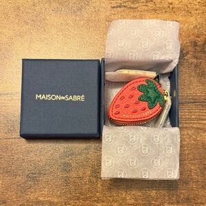 The Strawberry SABRÉMOJI™ Fruit Charm AirTag Holder